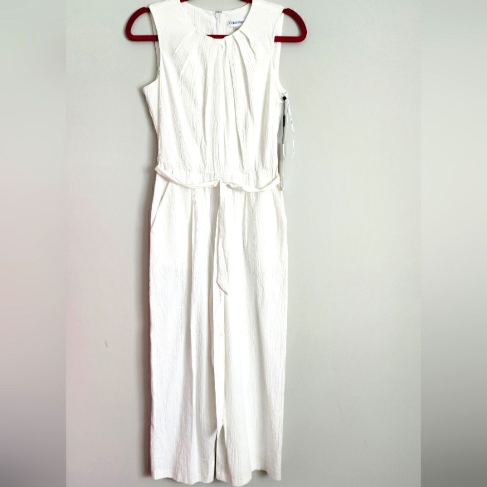 NEW WOMEN'S JUMPSUIT  CALVIN KLEIN WHITE COLOR ON A SNAKE SIZE 2.